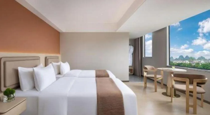 Bed in Immersing Hotel Guilin Two Rivers and Four Lakes Dongxi Alley