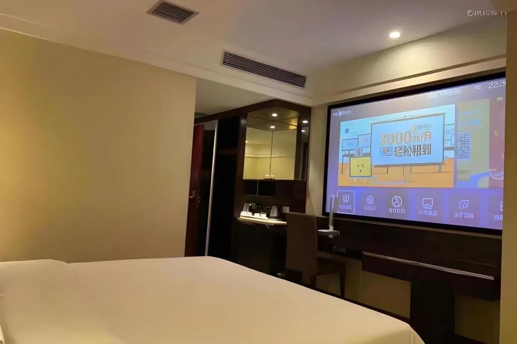 Bed in Borrman Hotel Guangzhou Changlong Shiqiao Metro Station