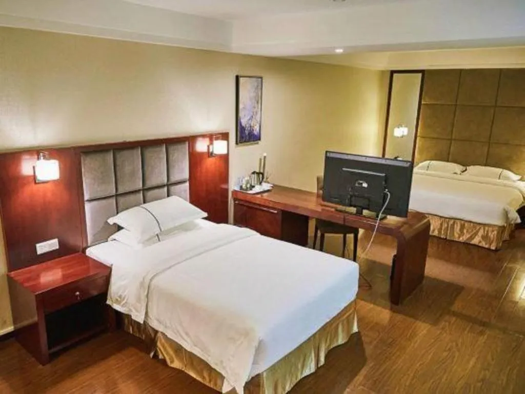 Bed in Borrman Hotel Guangzhou Changlong Shiqiao Metro Station