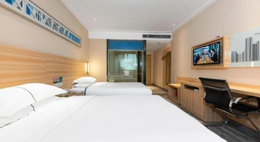 Bed in Jtour Inn Huanggang Hongan Lieshi Lingyuan