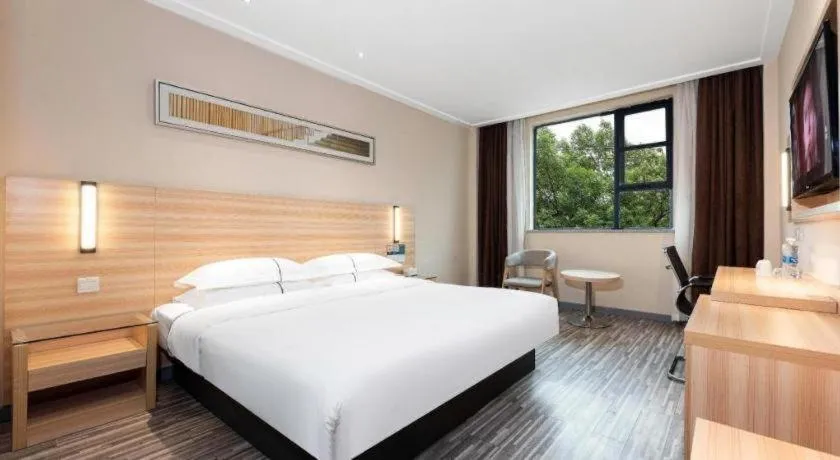 Bed in Jtour Inn Huanggang Hongan Lieshi Lingyuan