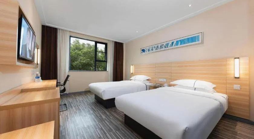 Bed in Jtour Inn Huanggang Hongan Lieshi Lingyuan