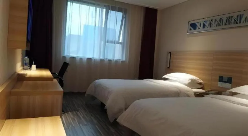 Bed in Jtour Inn Huanggang Hongan Lieshi Lingyuan