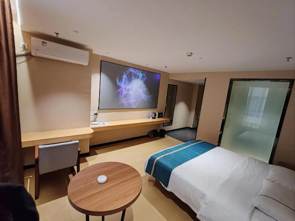 Bed in JTOUR Inn Maoming Gaozhou Guabangling Park