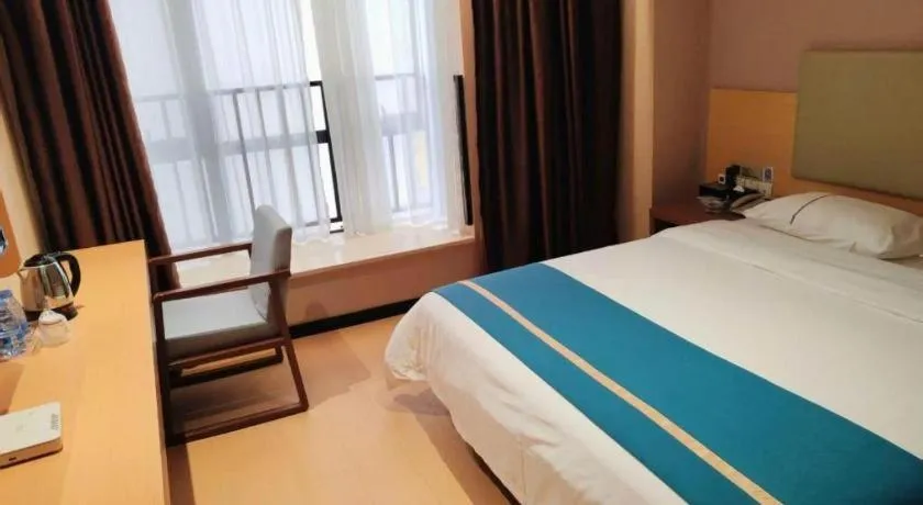 Bed in JTOUR Inn Maoming Gaozhou Guabangling Park