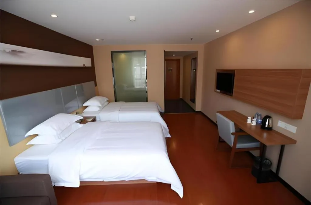 Bed in JTOUR Inn Maoming Gaozhou Guabangling Park