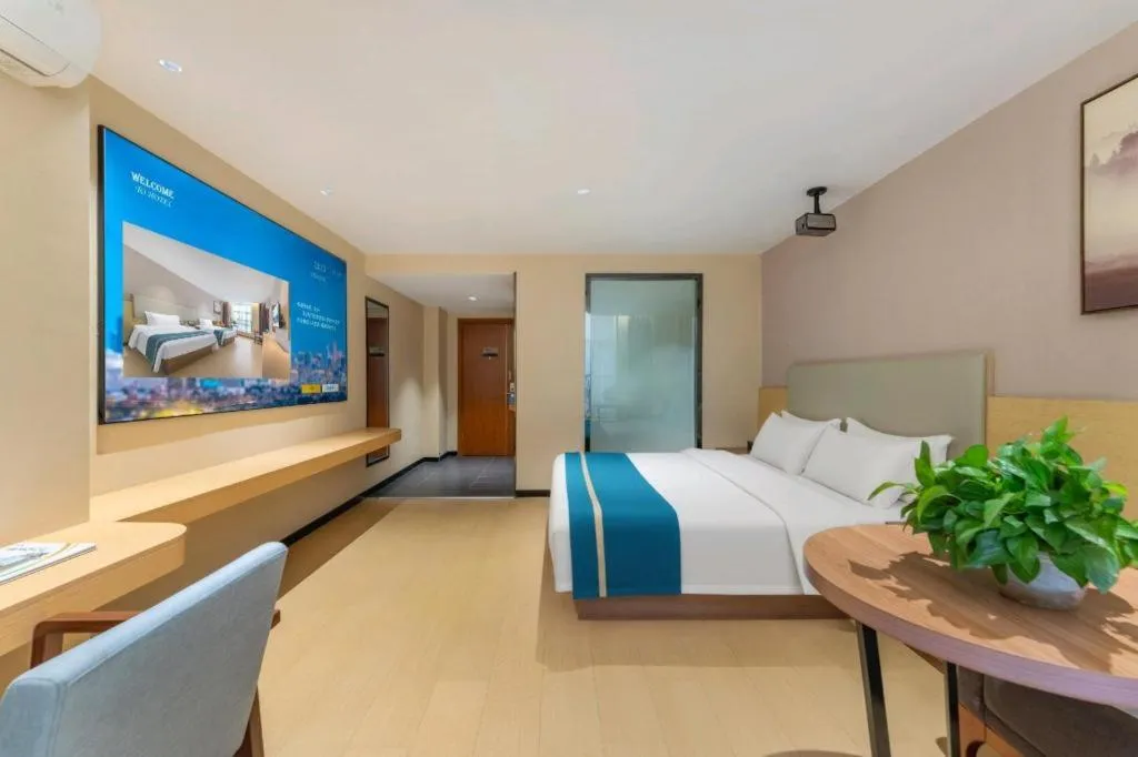 Bed in JTOUR Inn Maoming Gaozhou Guabangling Park