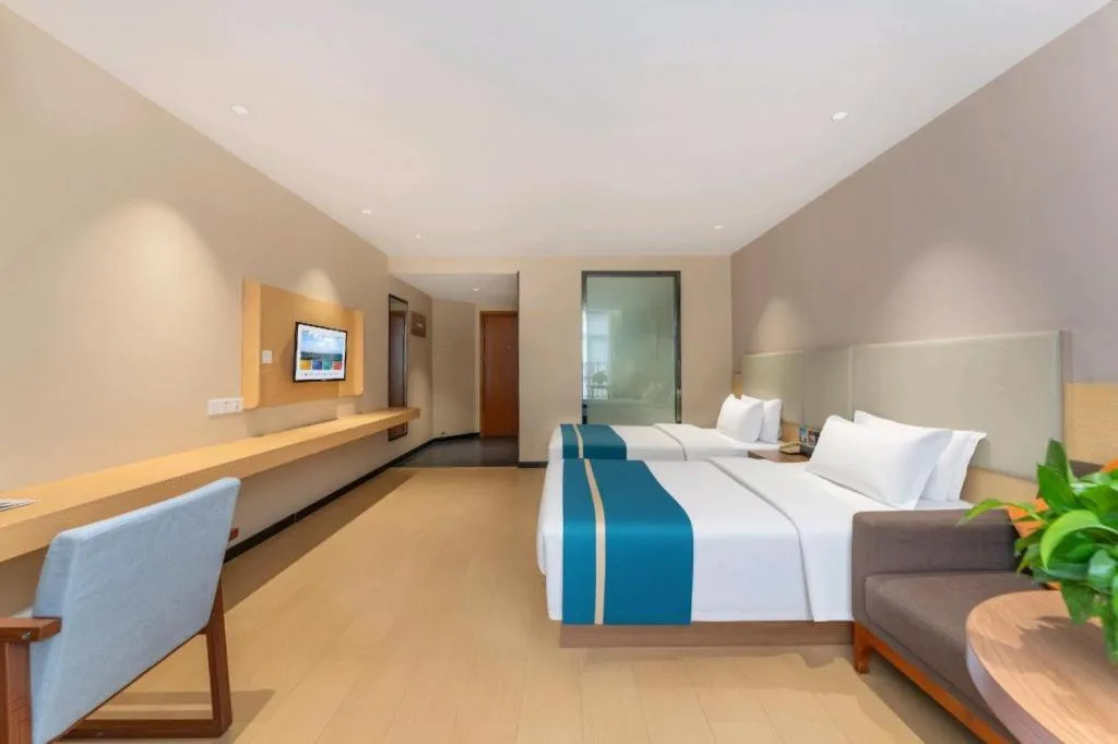 Bed in JTOUR Inn Maoming Gaozhou Guabangling Park