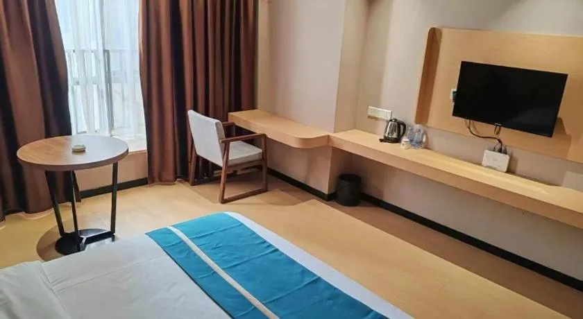 Bed in JTOUR Inn Maoming Gaozhou Guabangling Park
