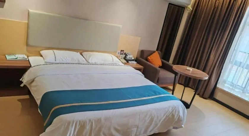 Bed in JTOUR Inn Maoming Gaozhou Guabangling Park