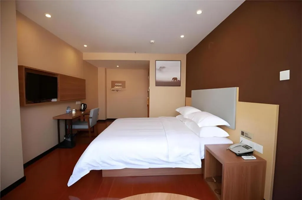 Bed in JTOUR Inn Maoming Gaozhou Guabangling Park