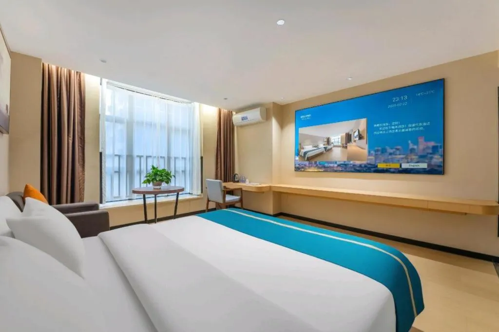 Bed in JTOUR Inn Maoming Gaozhou Guabangling Park
