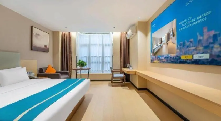 Bed in JTOUR Inn Maoming Gaozhou Guabangling Park