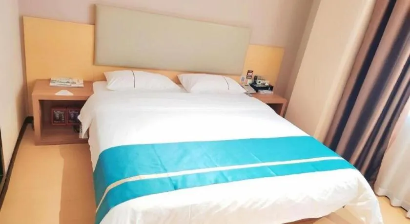 Bed in JTOUR Inn Maoming Gaozhou Guabangling Park