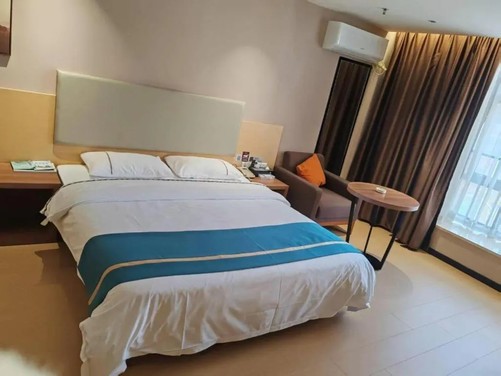 Bed in JTOUR Inn Maoming Gaozhou Guabangling Park