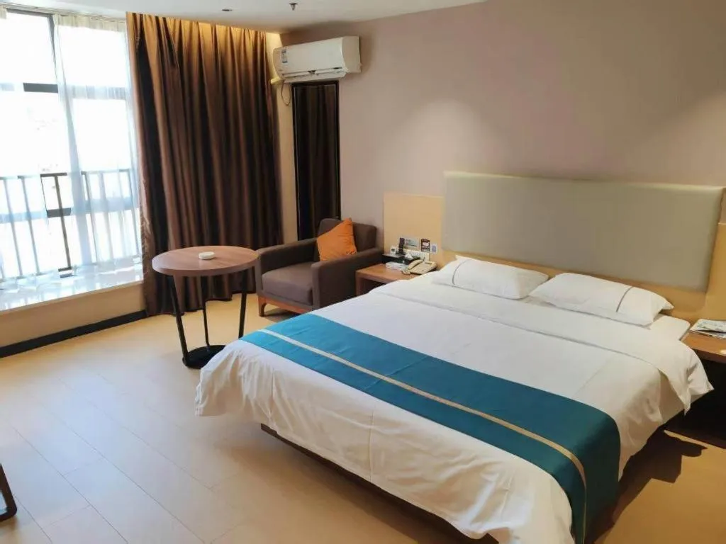 Bed in JTOUR Inn Maoming Gaozhou Guabangling Park