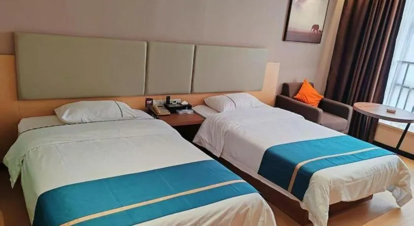 Bed in JTOUR Inn Maoming Gaozhou Guabangling Park