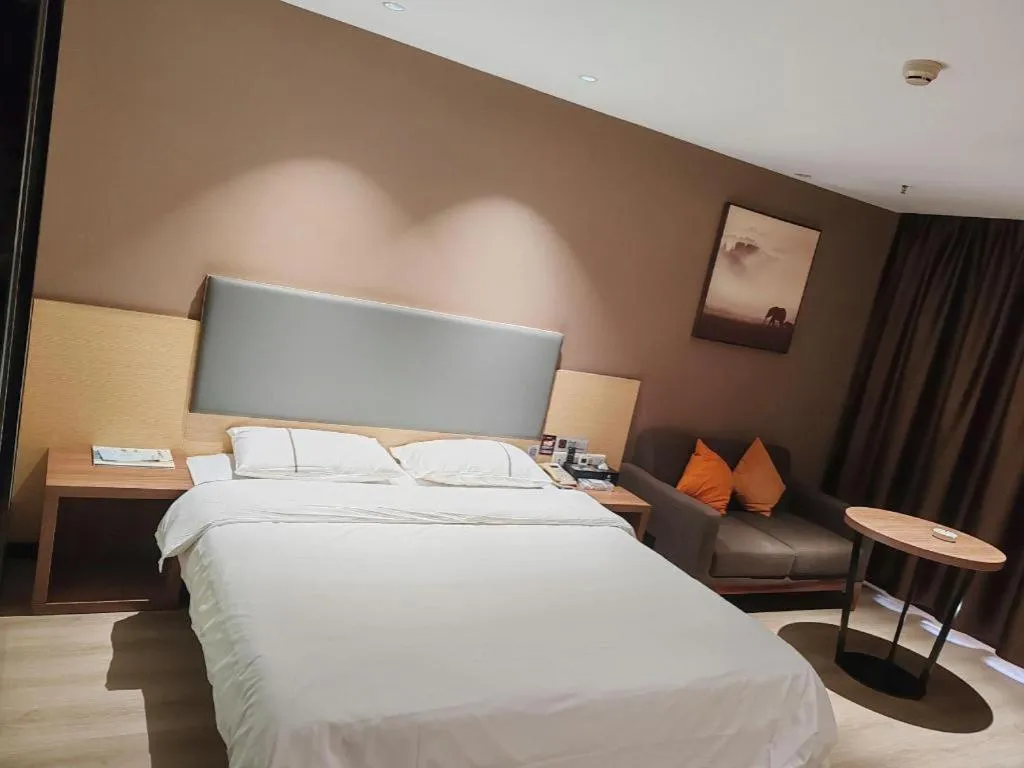 Bed in JTOUR Inn Maoming Gaozhou Guabangling Park