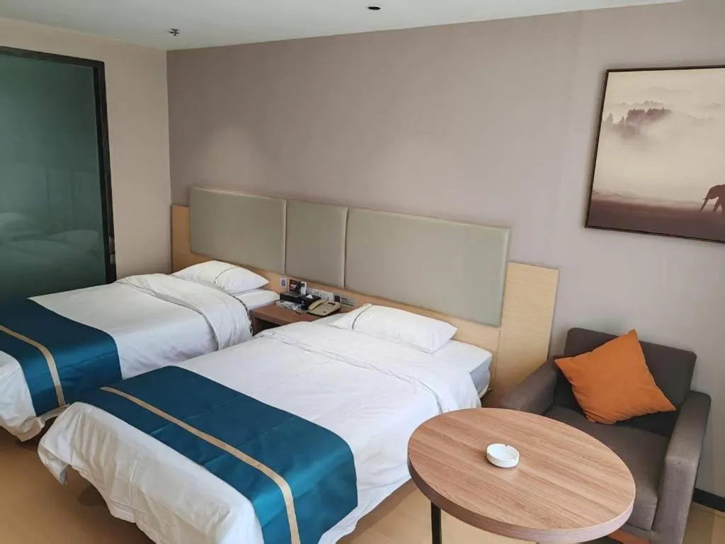 Bed in JTOUR Inn Maoming Gaozhou Guabangling Park