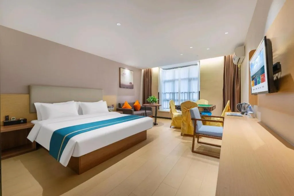 Bed in JTOUR Inn Maoming Gaozhou Guabangling Park