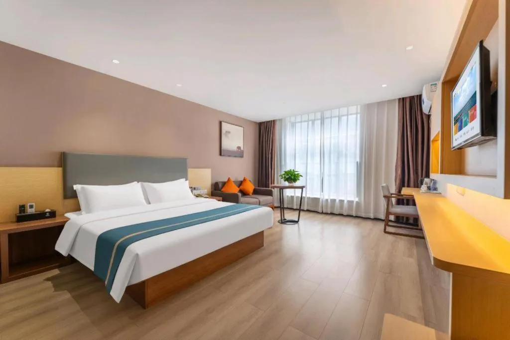 Bed in JTOUR Inn Maoming Gaozhou Guabangling Park