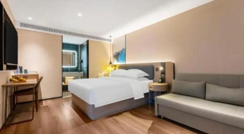 Bed in Echarm Hotel Wuhan Vanke Future Center Wulidun Metro Station