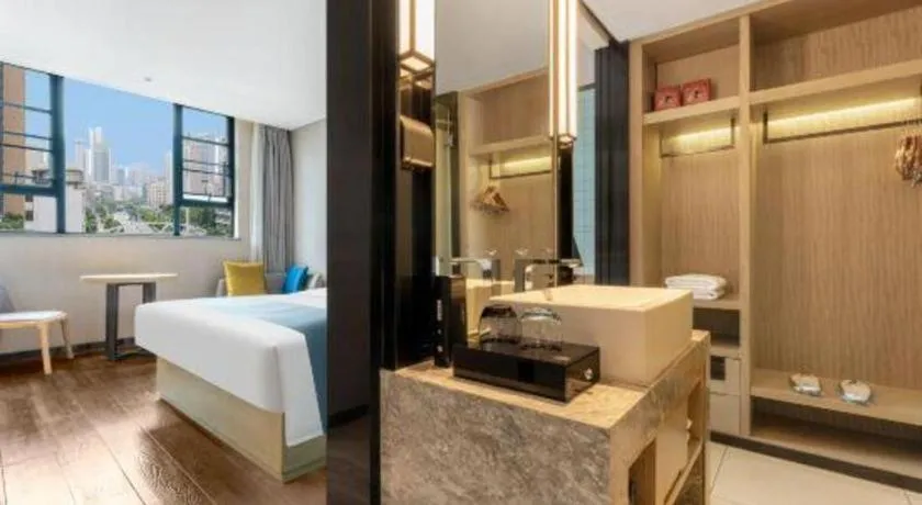 Bed in Echarm Hotel Wuhan Vanke Future Center Wulidun Metro Station