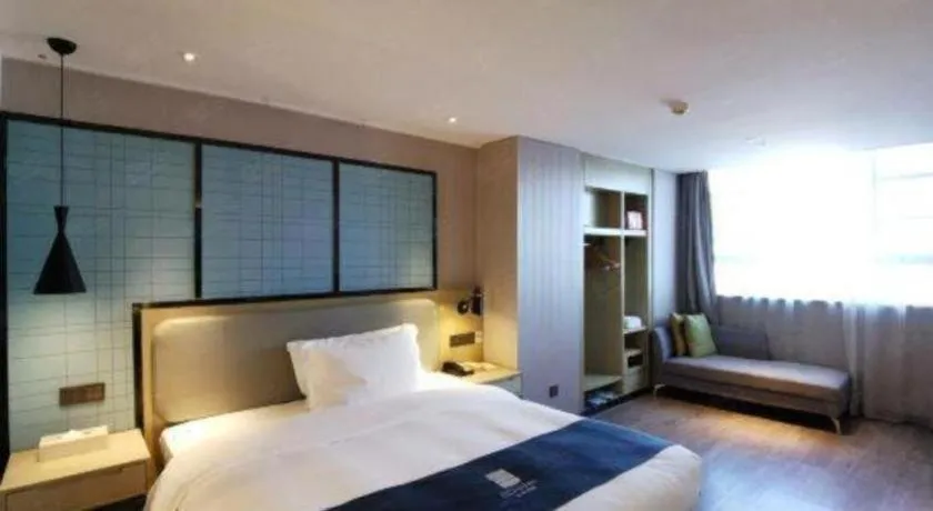 Bed in Echarm Hotel Wuhan Vanke Future Center Wulidun Metro Station