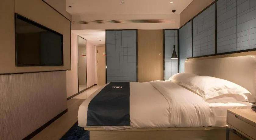 Bed in Echarm Hotel Wuhan Vanke Future Center Wulidun Metro Station