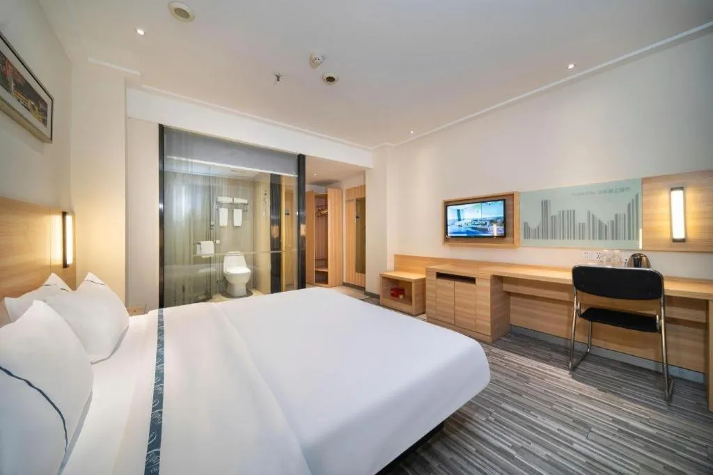 Bed in City Comfort Inn Wuhan East Lake Scenic Area Happy Valley