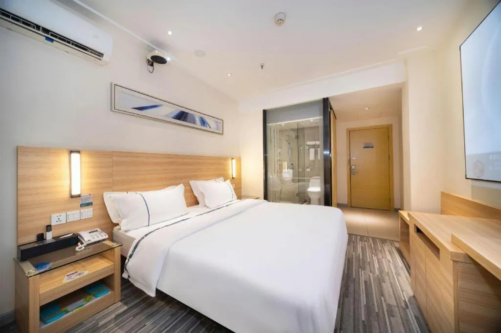 Bed in City Comfort Inn Wuhan East Lake Scenic Area Happy Valley