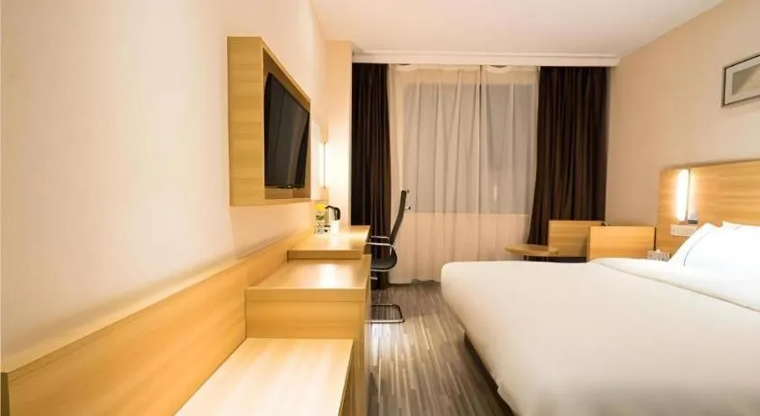 Bed in City Comfort Inn Wuhan East Lake Scenic Area Happy Valley