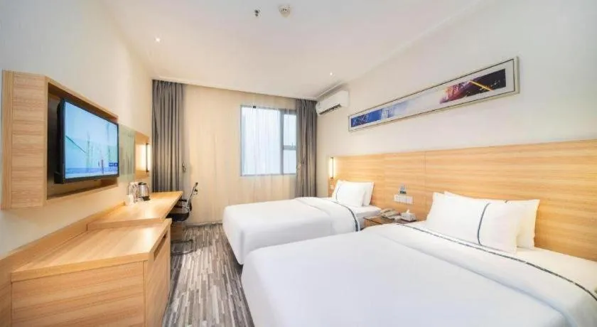 Bed in City Comfort Inn Wuhan East Lake Scenic Area Happy Valley