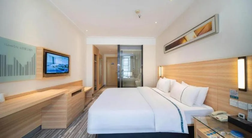 Bed in City Comfort Inn Wuhan East Lake Scenic Area Happy Valley