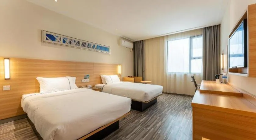 Bed in City Comfort Inn Wuhan East Lake Scenic Area Happy Valley