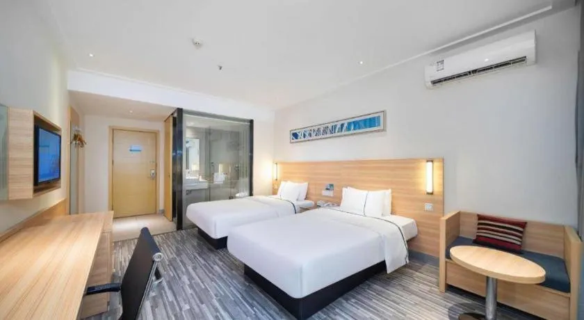 Bed in City Comfort Inn Wuhan East Lake Scenic Area Happy Valley