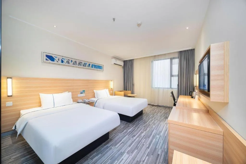 Bed in City Comfort Inn Wuhan East Lake Scenic Area Happy Valley