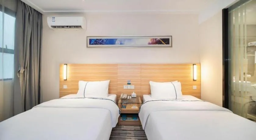 Bed in City Comfort Inn Wuhan East Lake Scenic Area Happy Valley