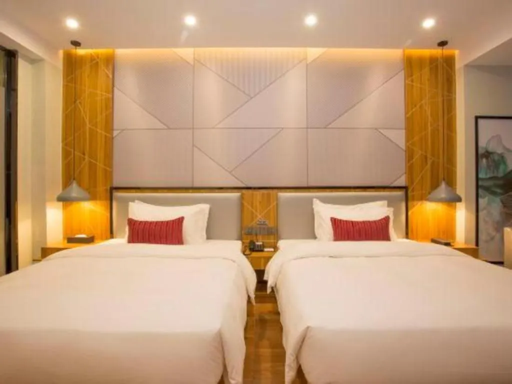 Bed in Borrman Hotel Fangchenggang High-speed Railway North Station Crystal International