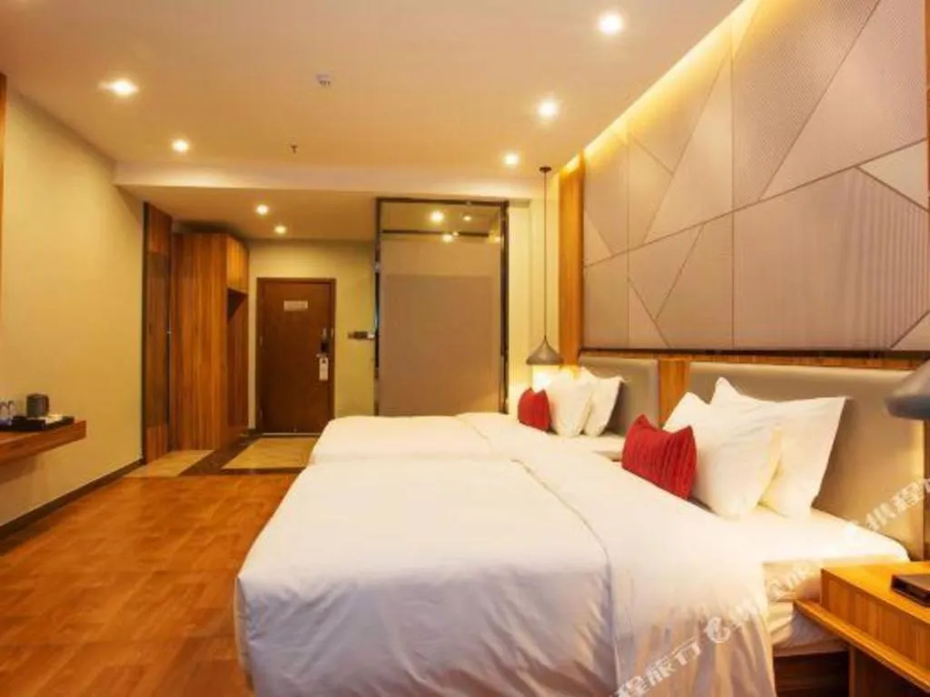 Bed in Borrman Hotel Fangchenggang High-speed Railway North Station Crystal International