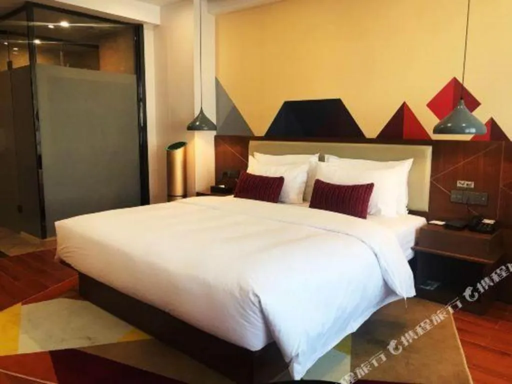 Bed in Borrman Hotel Fangchenggang High-speed Railway North Station Crystal International