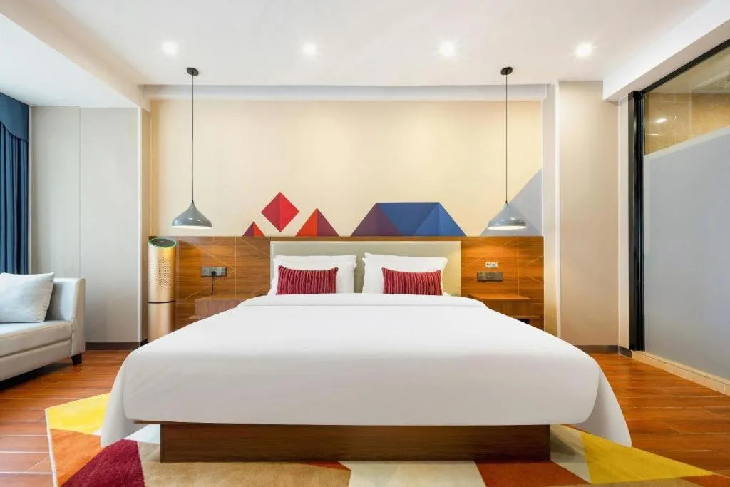 Bed in Borrman Hotel Fangchenggang High-speed Railway North Station Crystal International