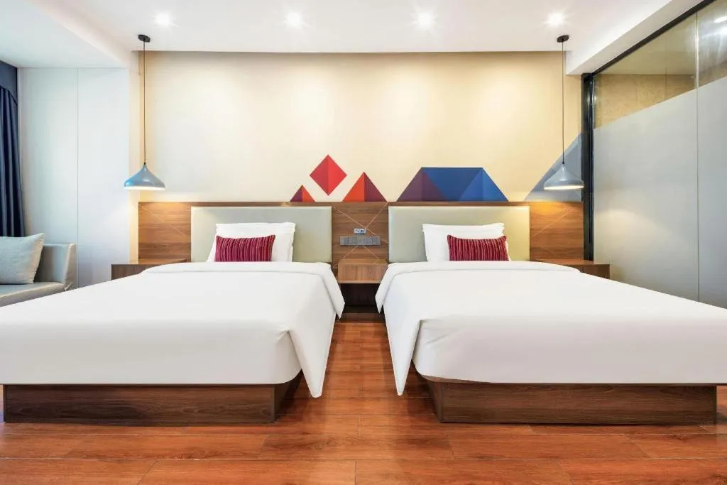 Bed in Borrman Hotel Fangchenggang High-speed Railway North Station Crystal International