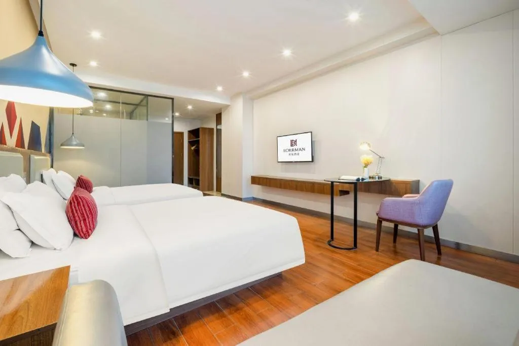 Bed in Borrman Hotel Fangchenggang High-speed Railway North Station Crystal International