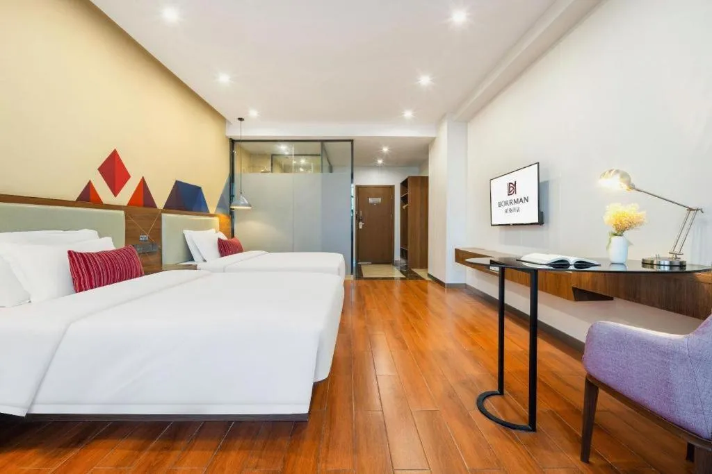 Bed in Borrman Hotel Fangchenggang High-speed Railway North Station Crystal International