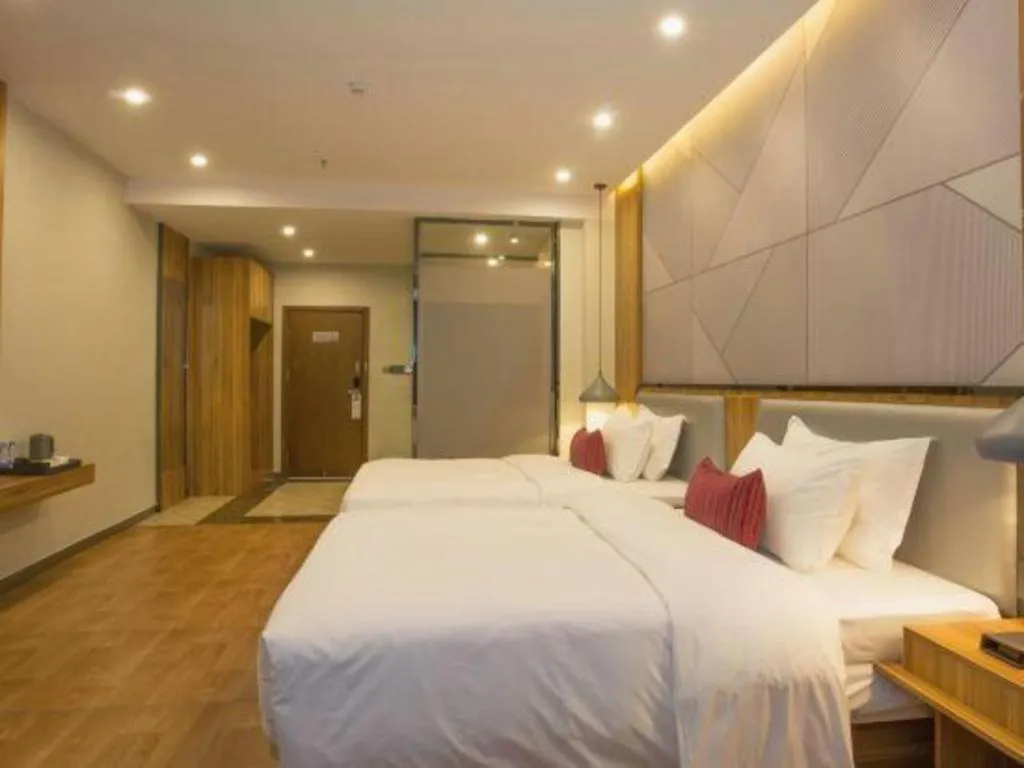 Bed in Borrman Hotel Fangchenggang High-speed Railway North Station Crystal International