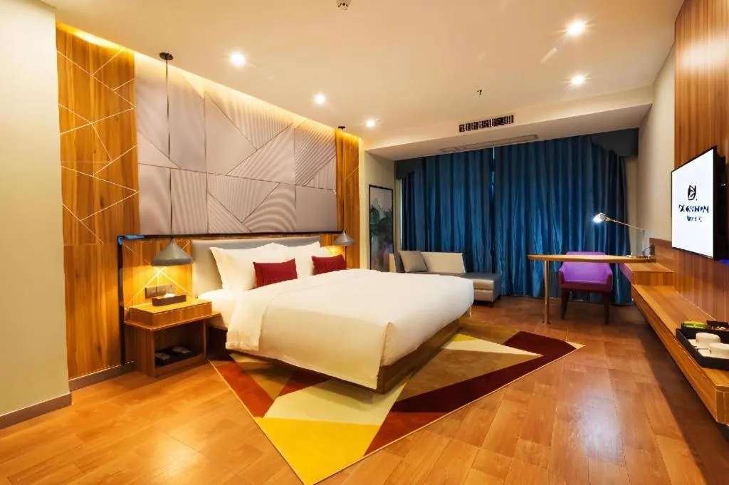 Bed in Borrman Hotel Fangchenggang High-speed Railway North Station Crystal International