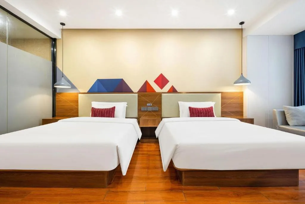 Bed in Borrman Hotel Fangchenggang High-speed Railway North Station Crystal International