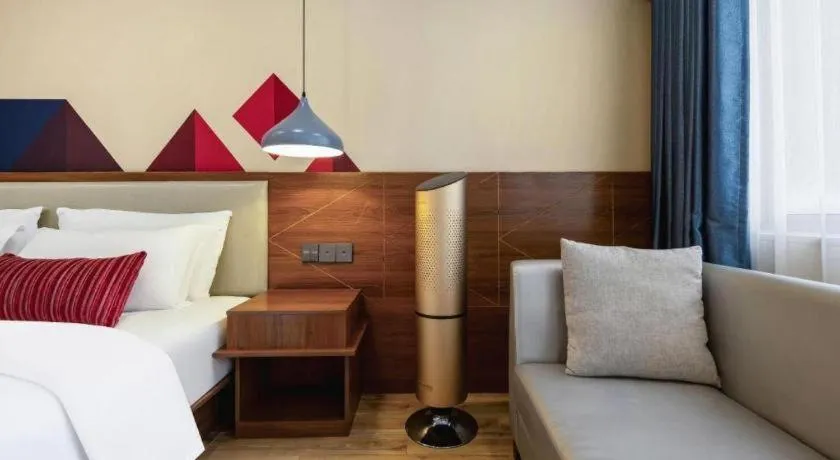 Bed in Borrman Hotel Fangchenggang High-speed Railway North Station Crystal International