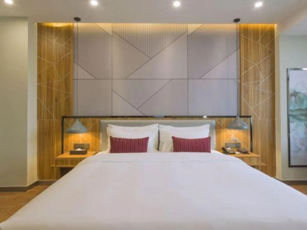 Bed in Borrman Hotel Fangchenggang High-speed Railway North Station Crystal International